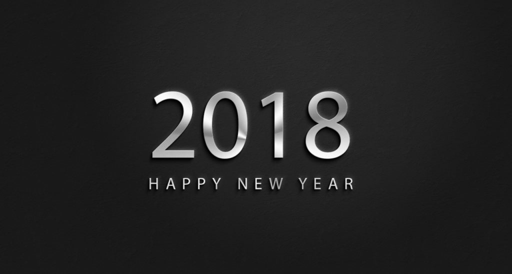 happy new year 2018 written in silver color with black background