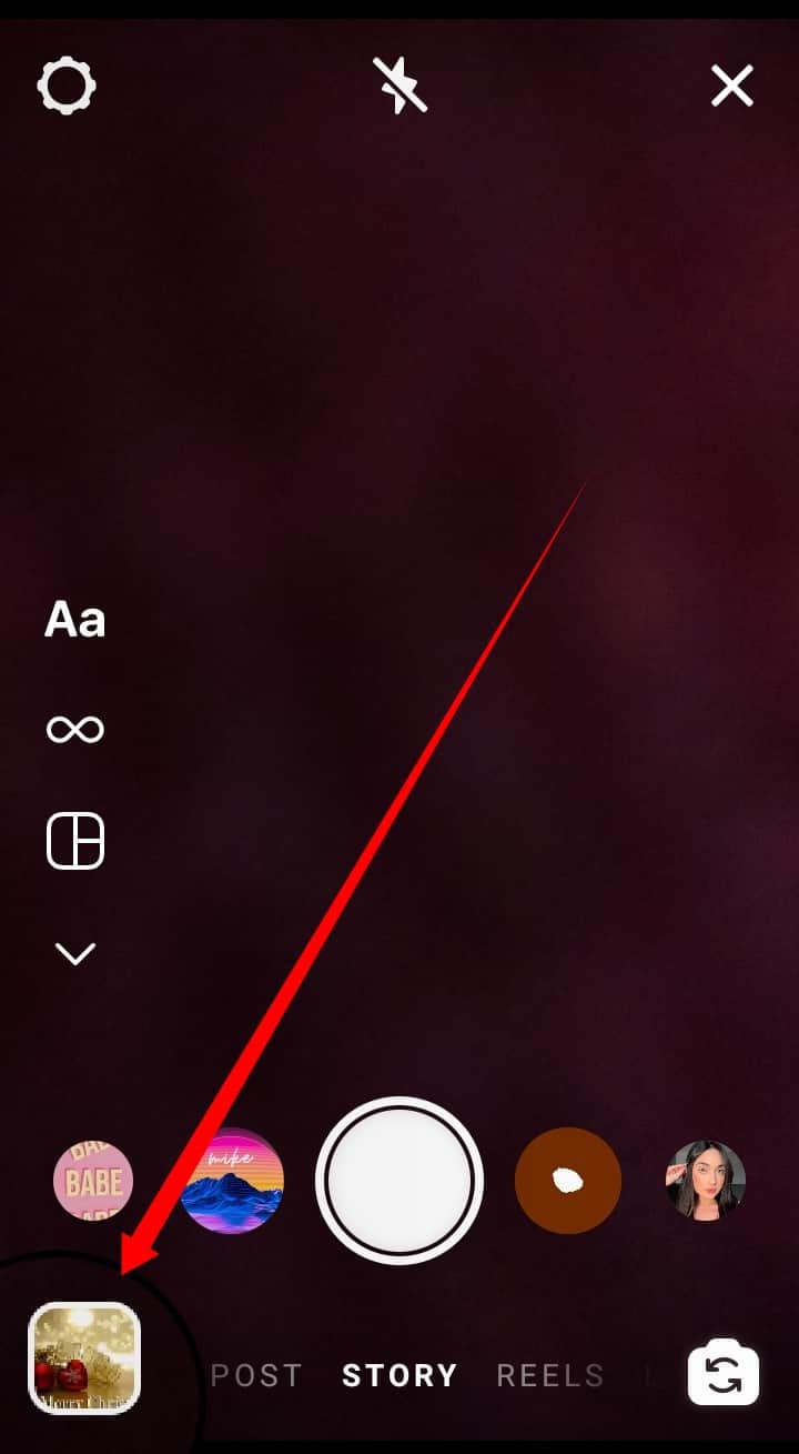 To access your Stories, tap the camera symbol 